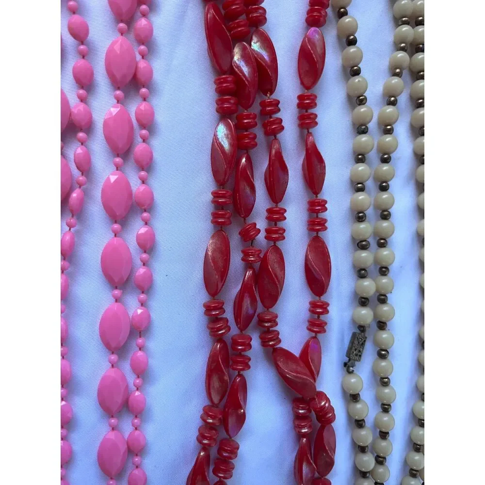 Lot of 4 plastic 1970's Vintage Long Necklaces